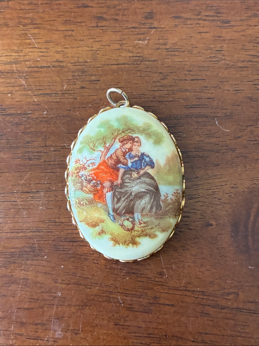 Fragonard Scalloped Porcelain Pendant — Courting Couple, Gold Tone